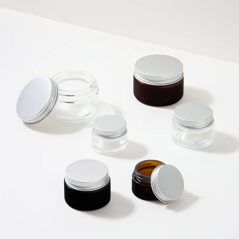 Pots cosmétiques en verre avec couvercles en aluminium - Ambre et transparent